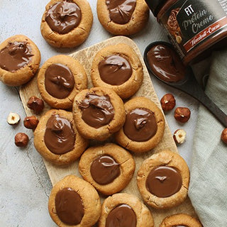 Thumbprint cookies sans beurre à la pâte à tartiner Thumbprint cookies sans beurre à la pâte à tartiner